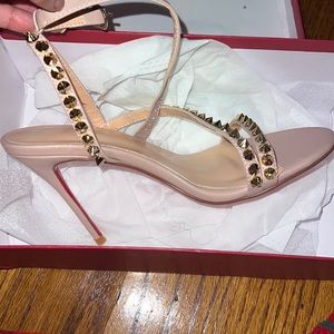 Nude size 7 strappy heel.